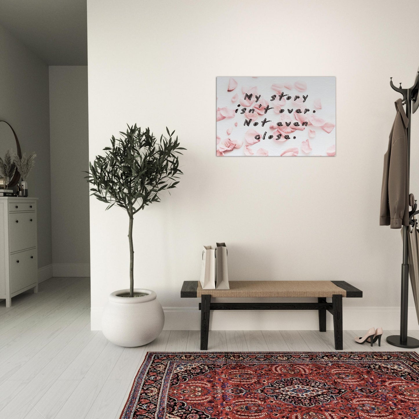 Elegant canvas with heartfelt quote on not giving up. Soft rose petal backdrop adds calm, emotional tone.