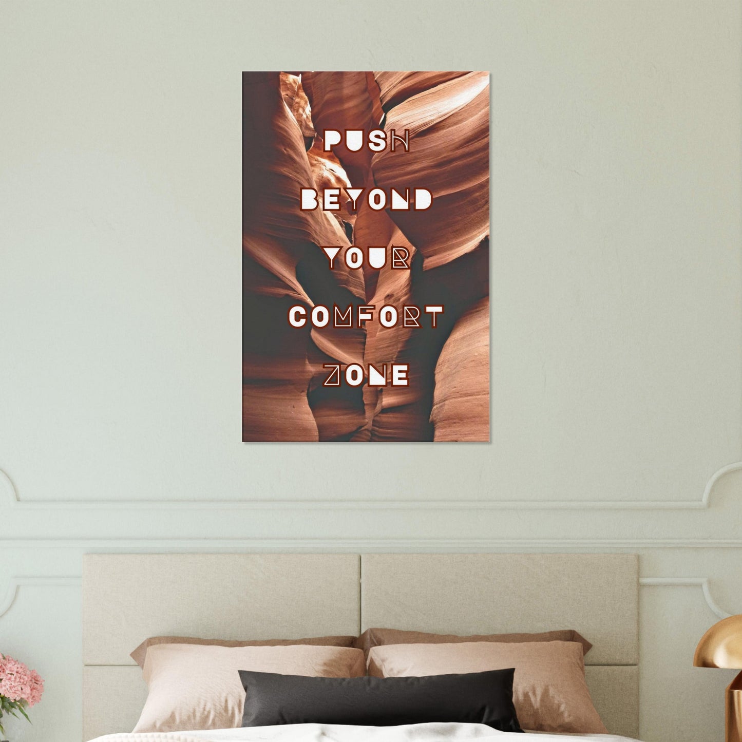 Empowering wall decor with 'Push Beyond Your Comfort Zone' in bold burgundy tones.