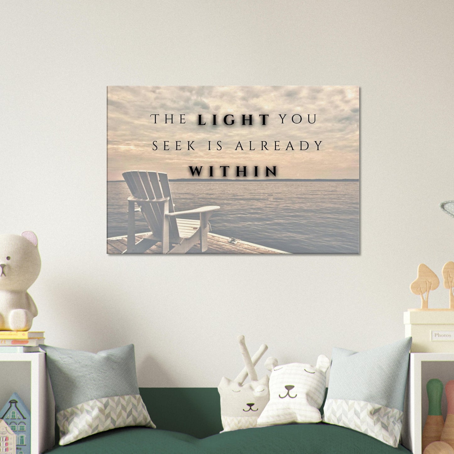 Gray and white wall art featuring wooden chair and calm water