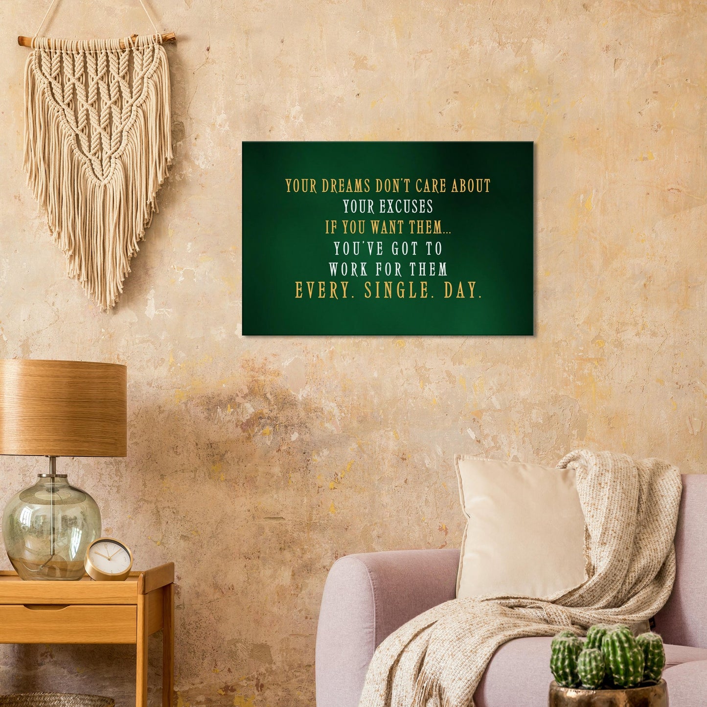 Bold motivational wall art with green background-quote about chasing goals without excuses in white and orange text.