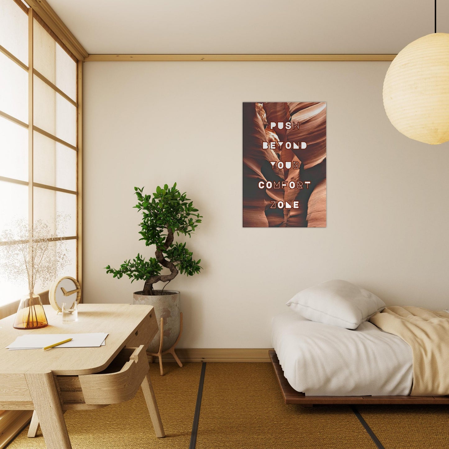 Inspirational canvas art: 'Push Beyond Your Comfort Zone' message on rich burgundy rock.
