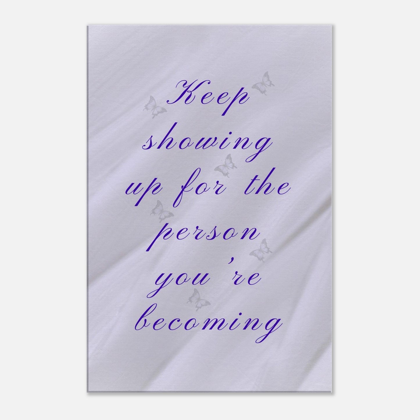 Motivational canvas wall art with lavender backdrop and quote, “Keep showing up for the person you're becoming”
