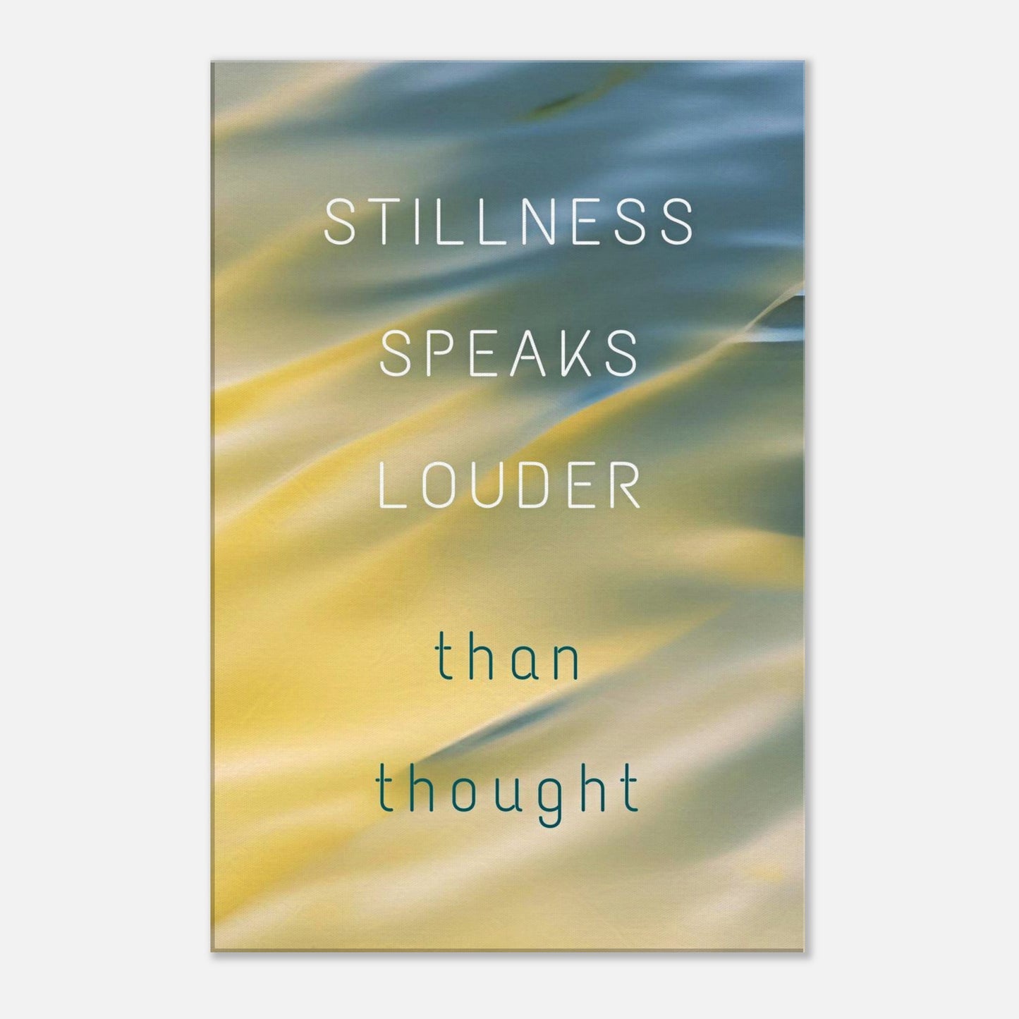 Spiritual canvas art with quote "Stillness Speaks Louder Than Thought" and satin-inspired soft colors