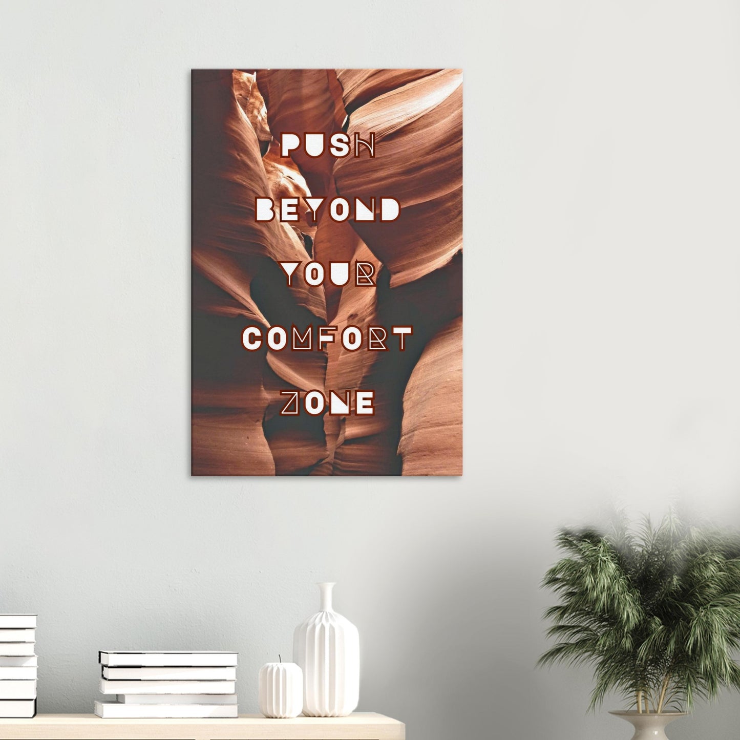 Burgundy background quote canvas: 'Push Beyond Your Comfort Zone' for daily motivation.