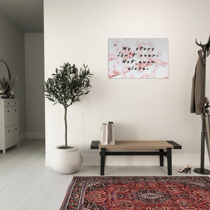 Elegant canvas with heartfelt quote on not giving up. Soft rose petal backdrop adds calm, emotional tone.