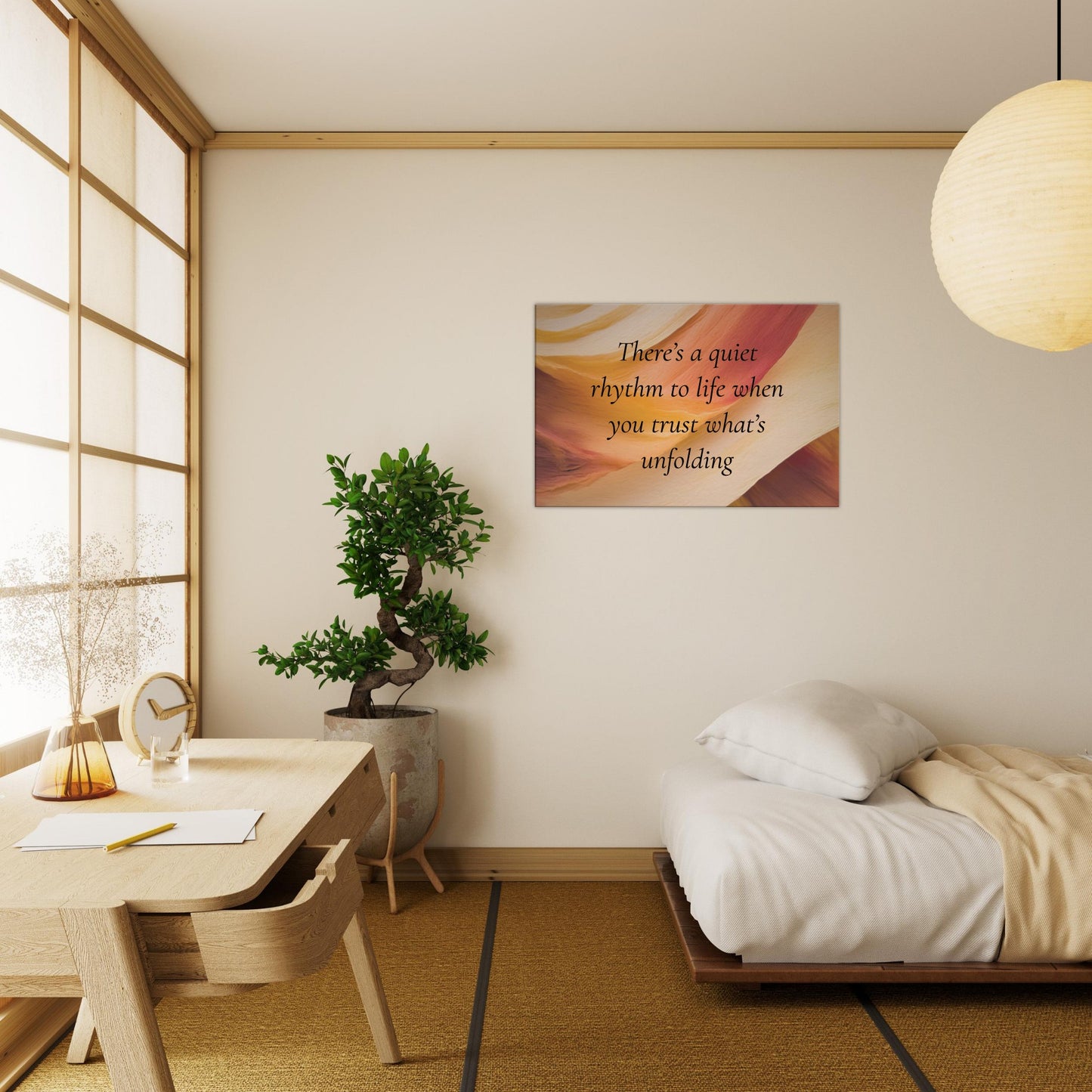 Canvas wall print with a quote "There's a quiet rhythm to life when you trust what's unfolding" on an abstract background with warm red, cream and caramel colors.  The spiritual canvas art is hanging on an off beige wall as bedroom decor. 