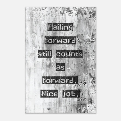 Motivational canvas print with quote “Failing forward still counts as forward” on abstract gray-white background.