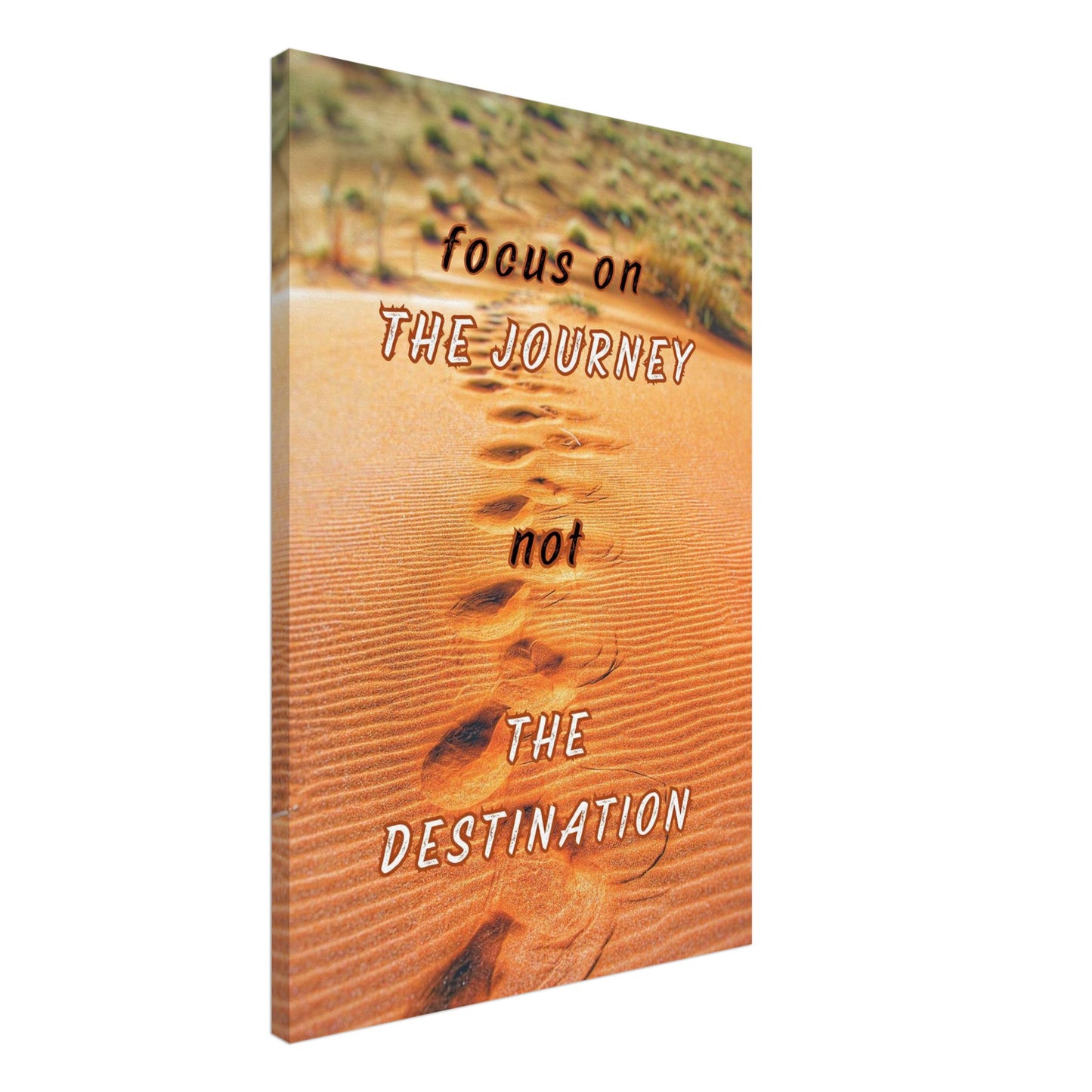 Inspirational canvas with orange desert sand, footprints, and bold quote about focusing on the journey

