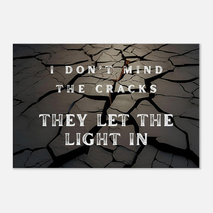 Spiritual canvas art with quote "I Don't Mind the Cracks..." and cracked earth with light imagery

