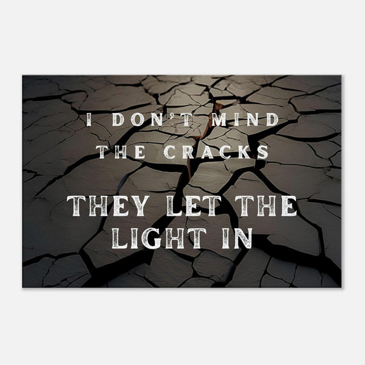 Spiritual canvas art with quote "I Don't Mind the Cracks..." and cracked earth with light imagery

