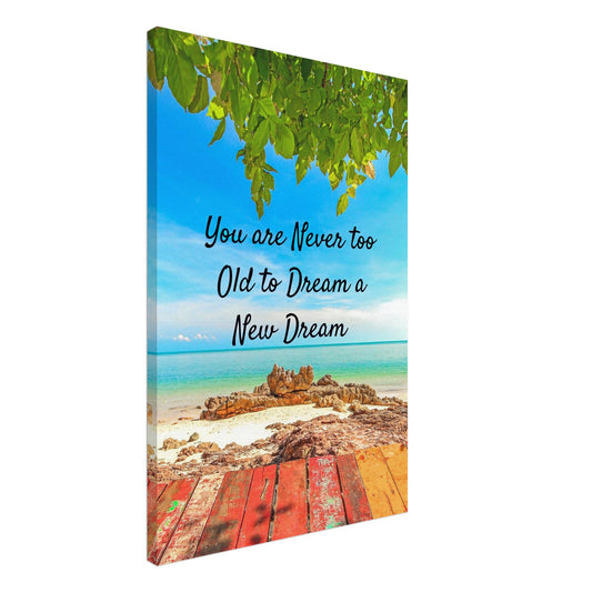 Vibrant blue sky over beach with quote 'You are never too old to dream a new dream.' Awakens any home living space. 