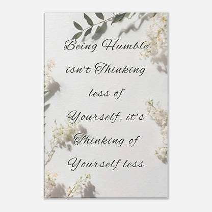Spiritual canvas art with humility quote and white floral background

