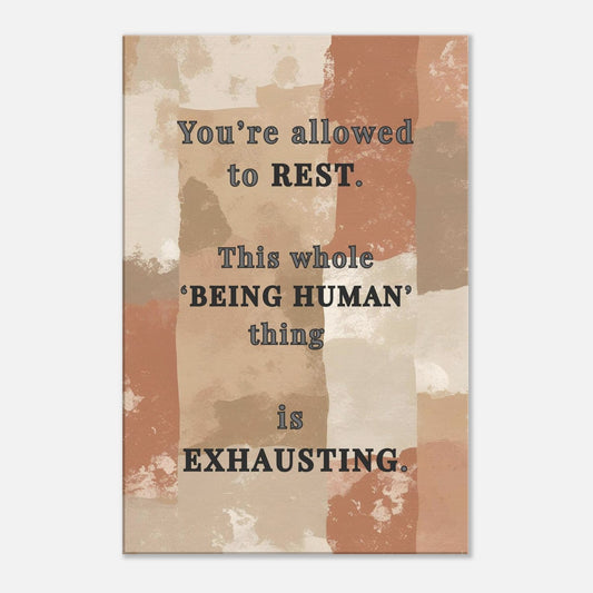 Inspirational quote canvas print reading “You’re allowed to rest…” with soft earthy background in terracotta and neutral tones


