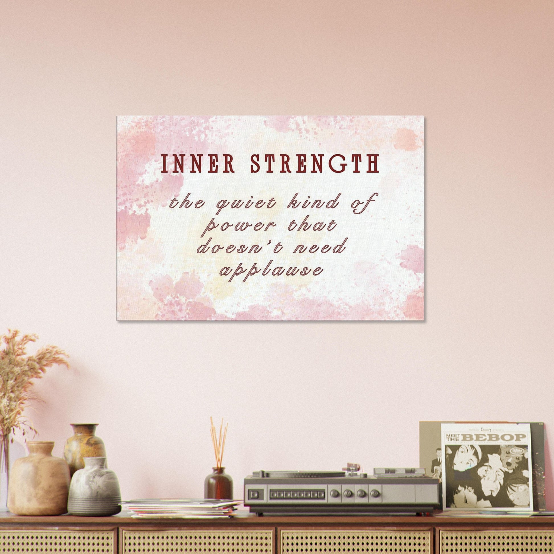Inspirational wall art featuring emotional quote in red over soft blended pastel background

