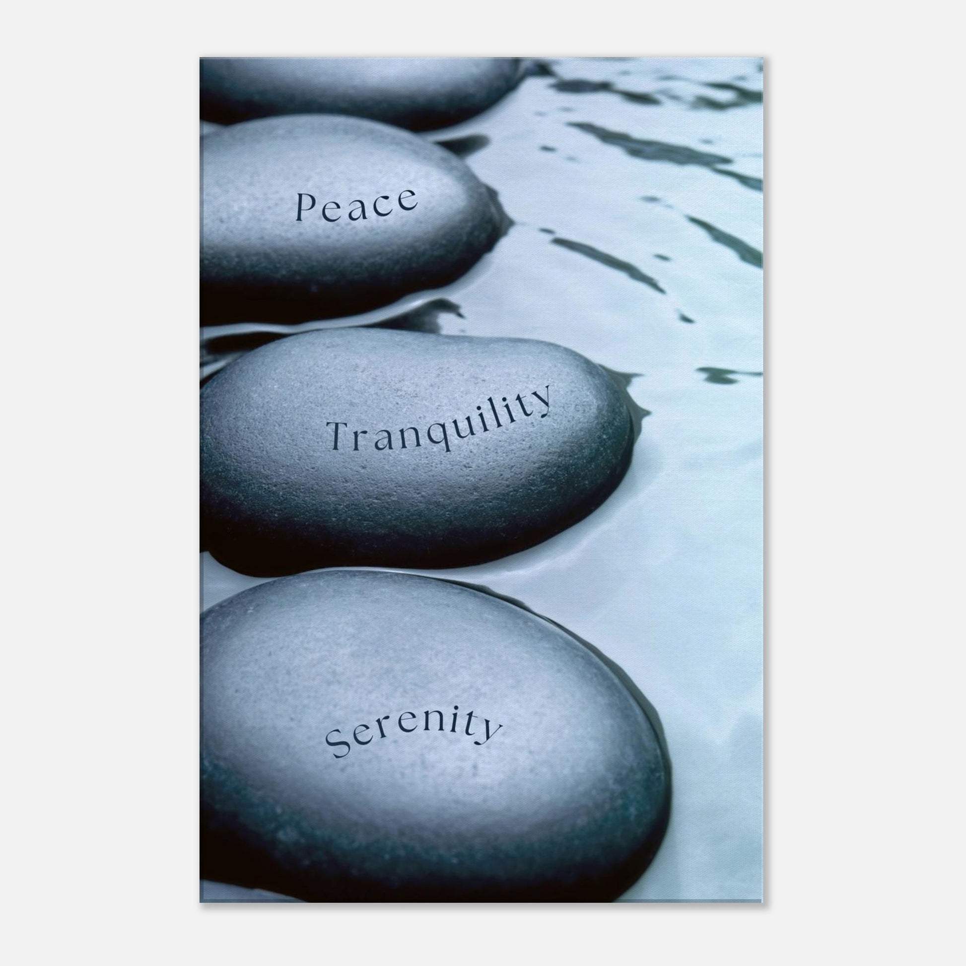 Inspirational wall art with three calm-themed rocks on meditative monochrome background

