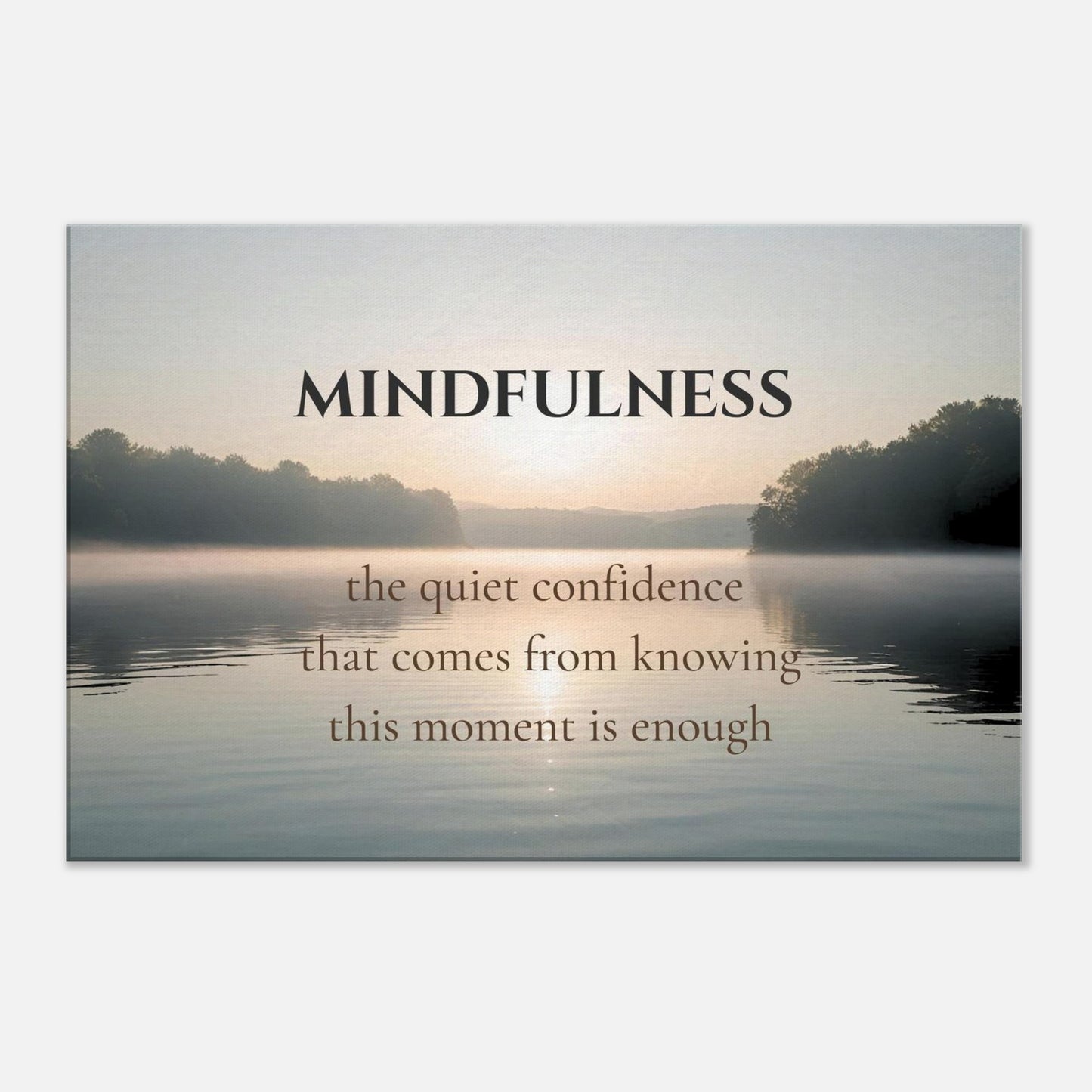 Inspirational canvas wall art with mindfulness quote over still lake at sunrise


