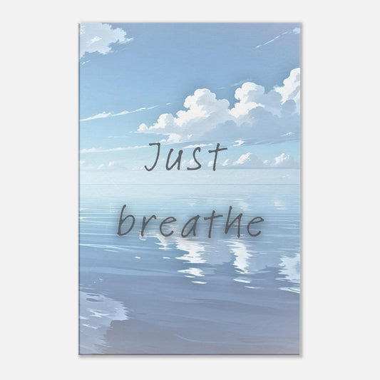 Peaceful ocean scene with soft clouds and the quote “Just breathe” in handwritten font across the water

