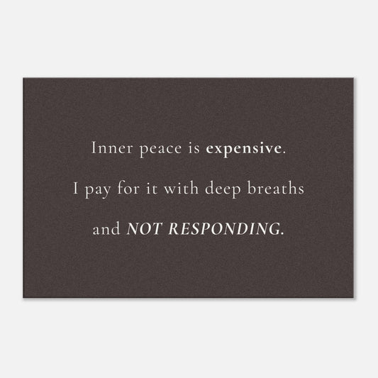 Black canvas wall art with white quote about inner peace, deep breaths, and boundaries



